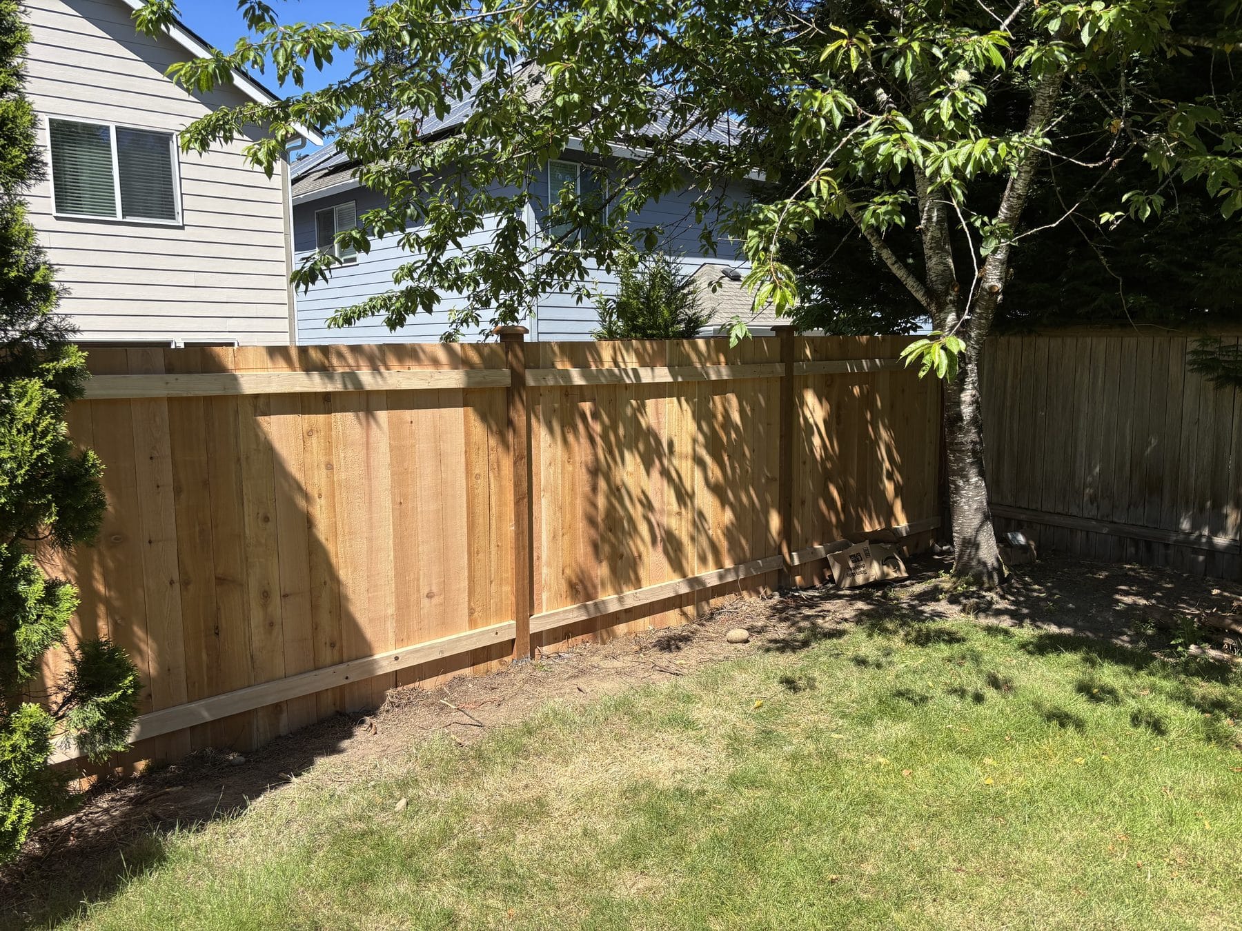New six foot estate-style cedar fence after replacement in Bothell WA