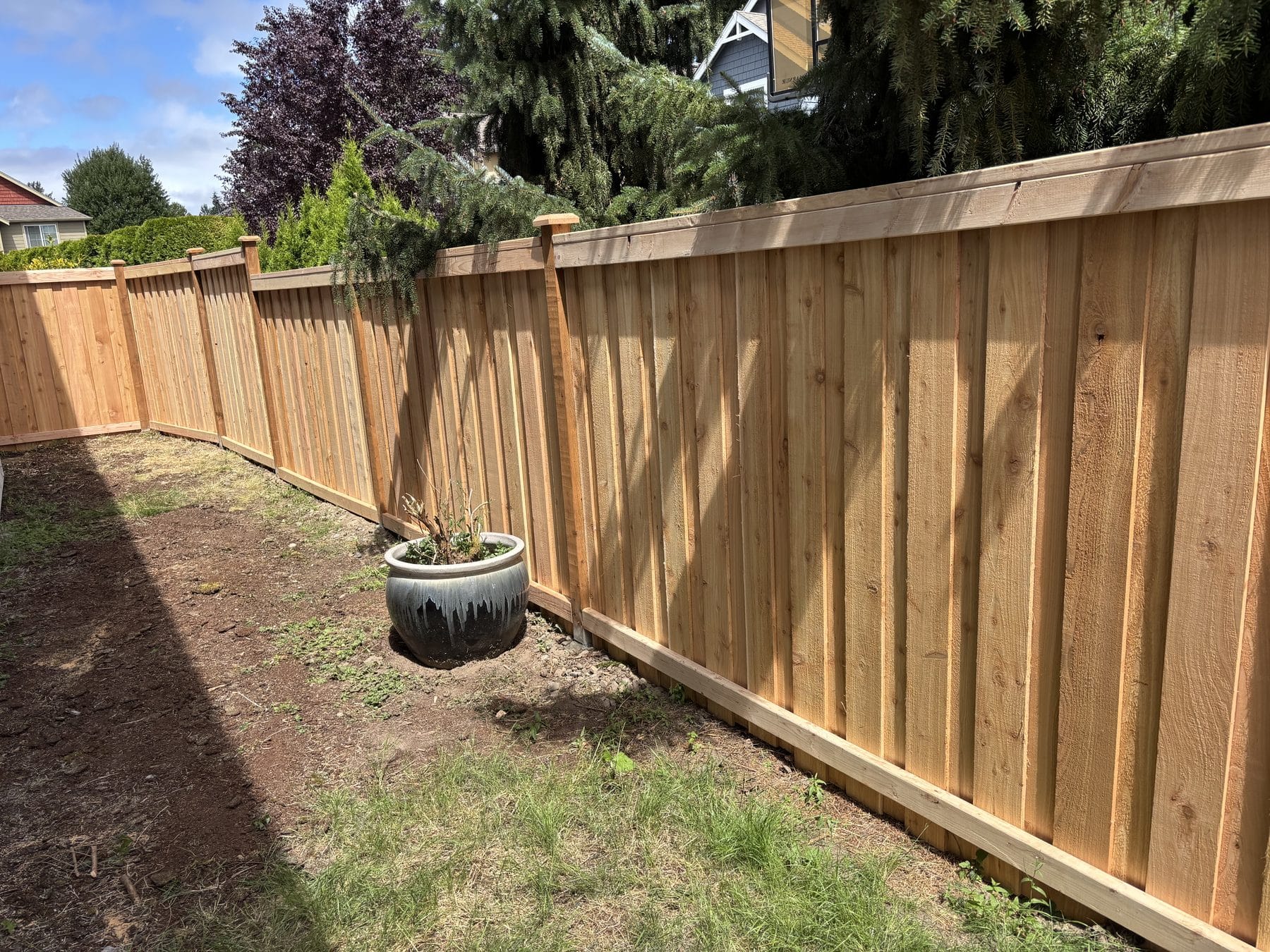 Completed 45 foot board-on-board cedar privacy fence in Bothell WA