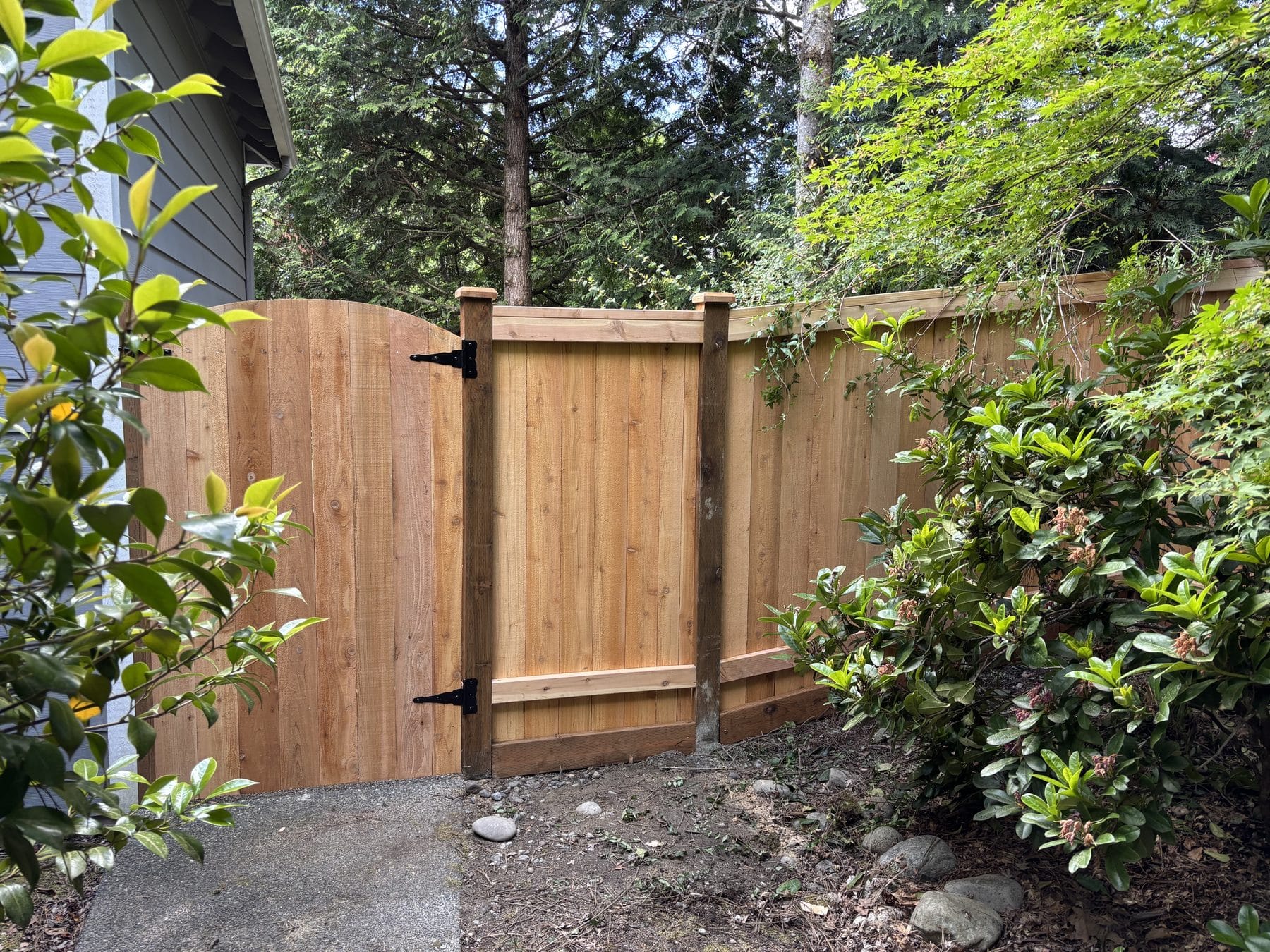 Custom cedar gate installed with a Kirkland privacy fence