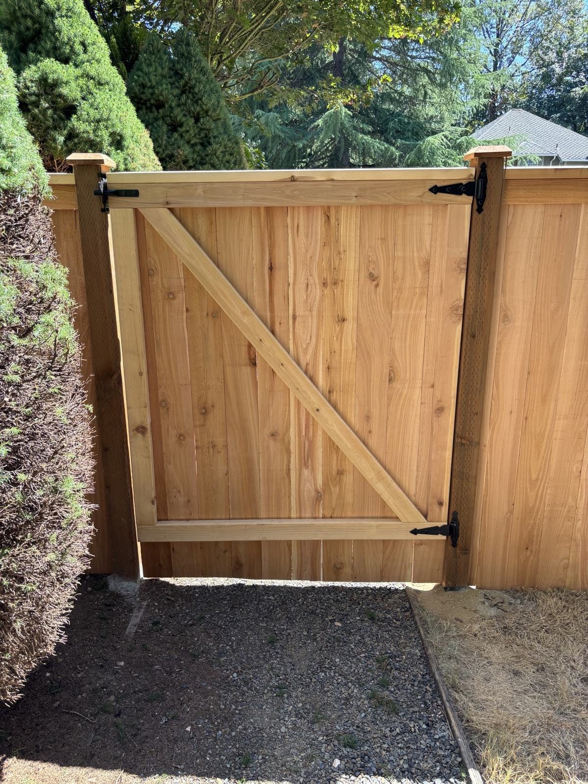 Custom cedar gate hardware and diagonal bracing in Redmond WA
